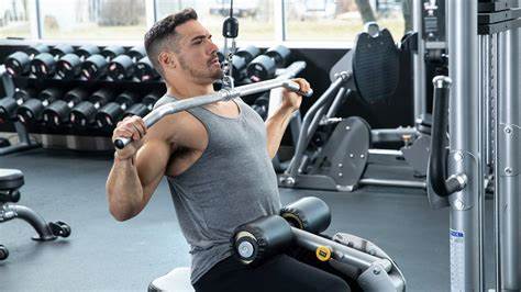 Man working out on a cable machine